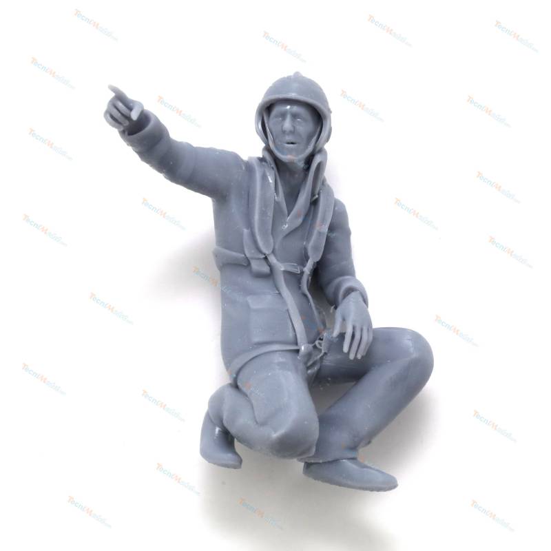 1 Figurine d'équipier SNSM agenouillé pointant du doigt 1/20