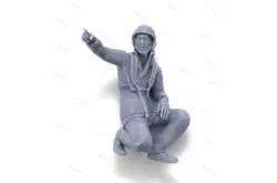 1 Figurine d'équipier SNSM agenouillé pointant du doigt 1/25