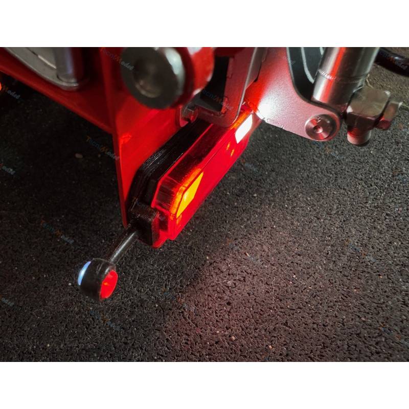Pair of flexible side marker lights mounted on 7-compartment trailer light brackets