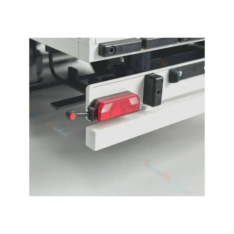 Pair of flexible side marker lights mounted on 7-compartment trailer light brackets
